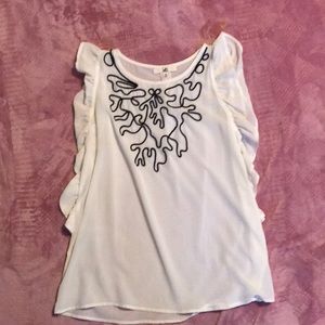 White sleeveless blouse